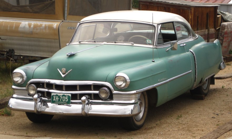 The body style and interior are very similar to the 1953 Cadillac another