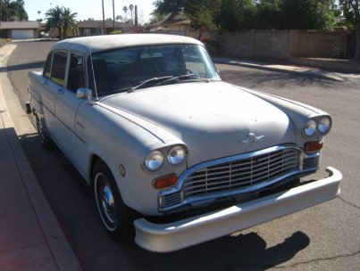 A silver 1974 Checker Marathon that was once an everyday driving family car